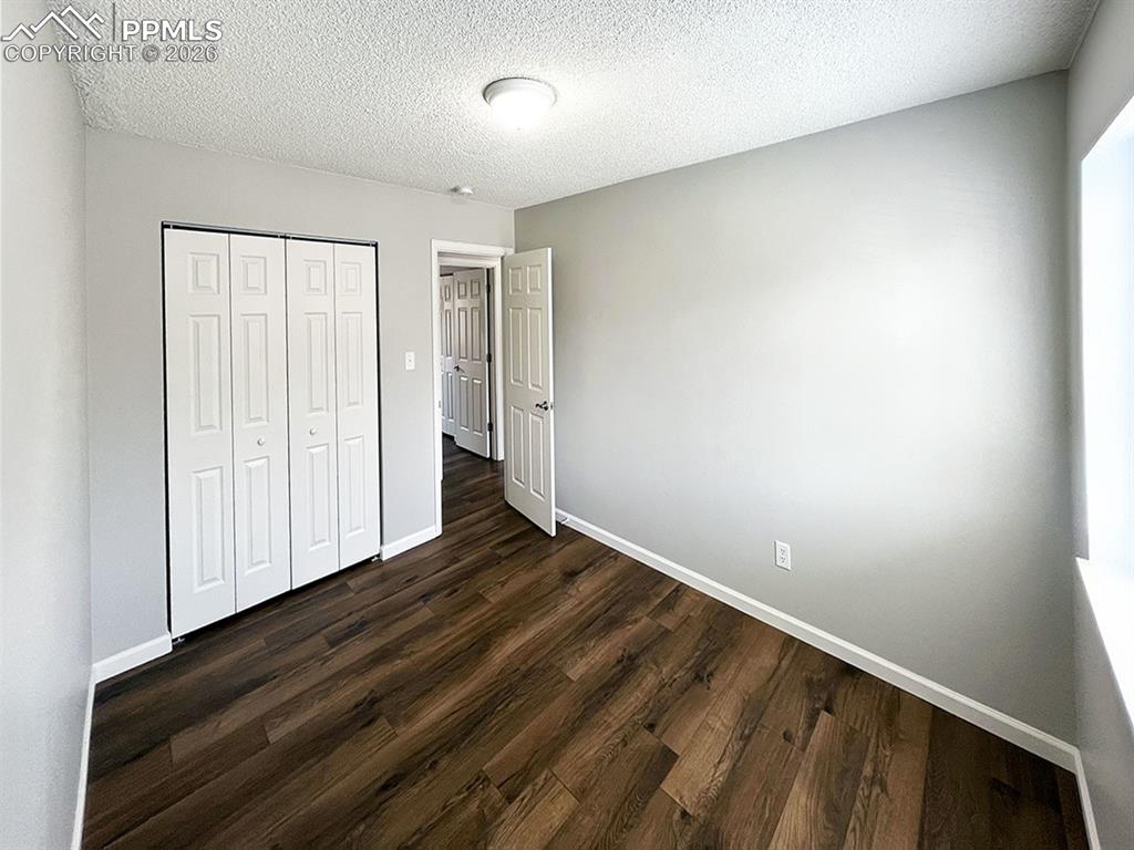 Image 14 of 23: Second bedroom