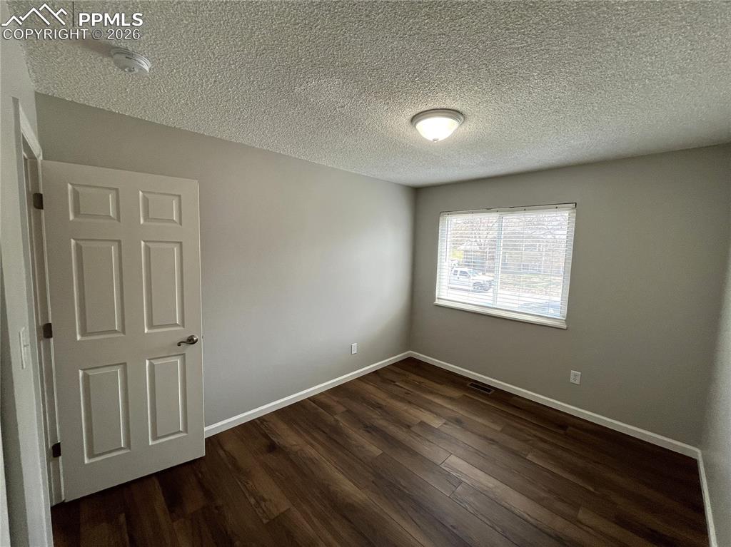 Image 16 of 23: Second bedroom