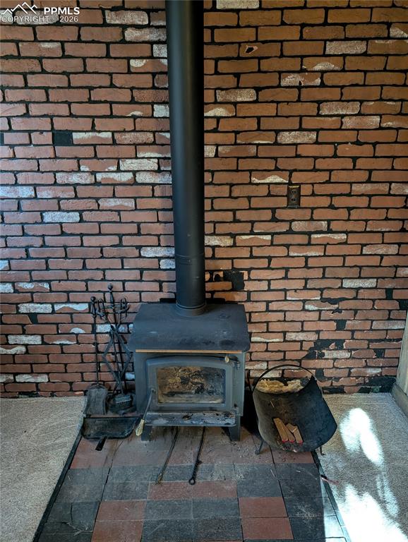 Image 9 of 27: Fireplace