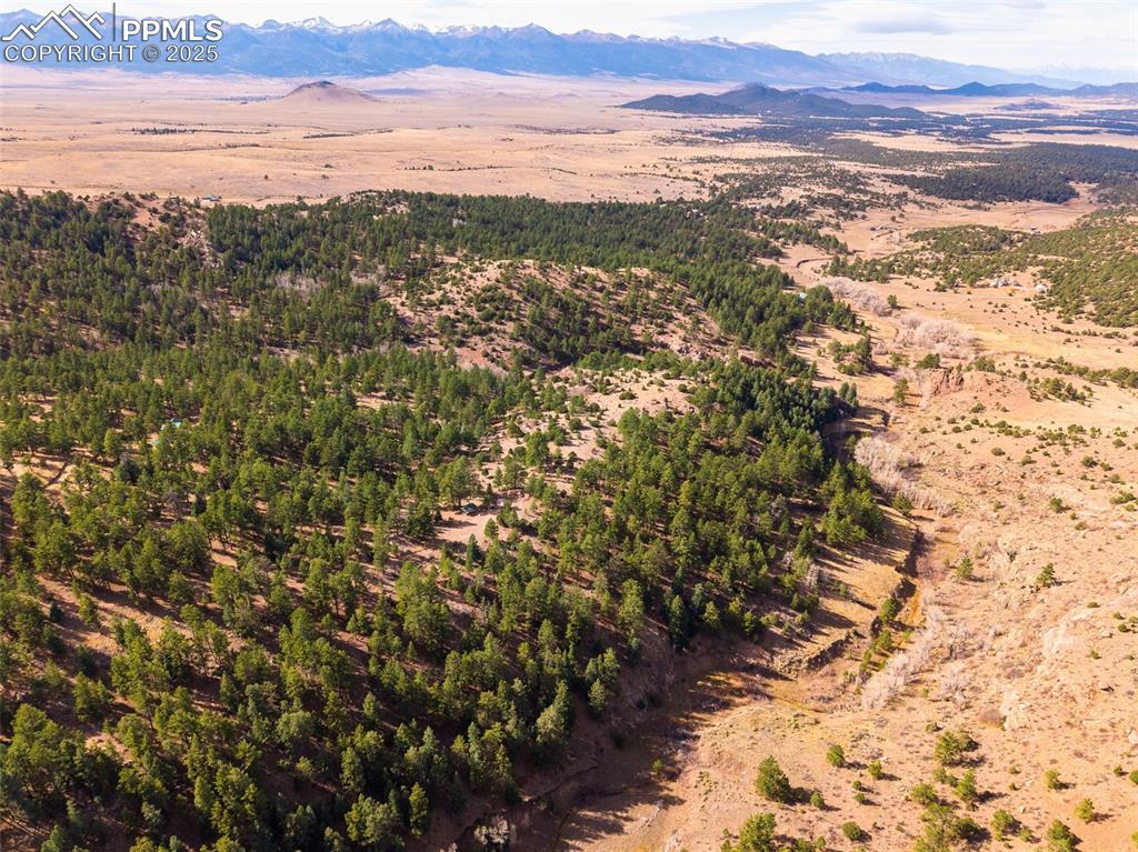 Image 22 of 25: Drone / aerial view of a mountainous background