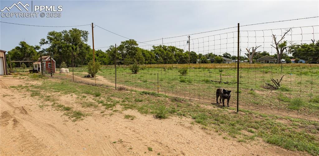 Image 44 of 50: View of yard with a rural view