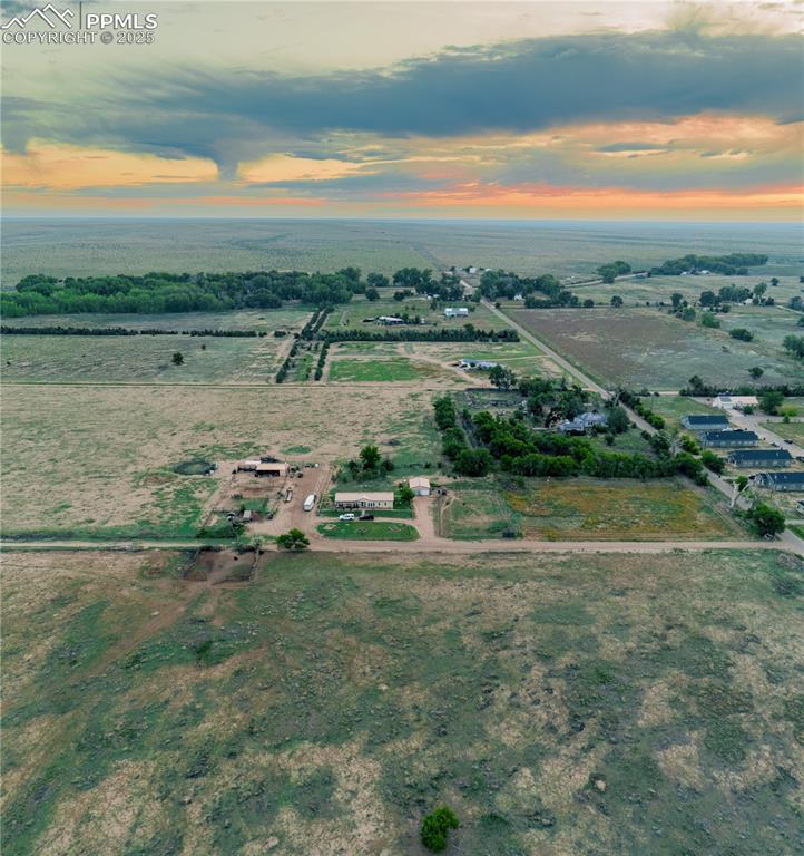 Image 5 of 50: Aerial view at dusk of a view of countryside