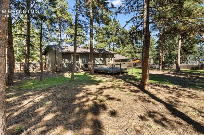 Image 3 of 26: Deck and backyard to enjoy!!