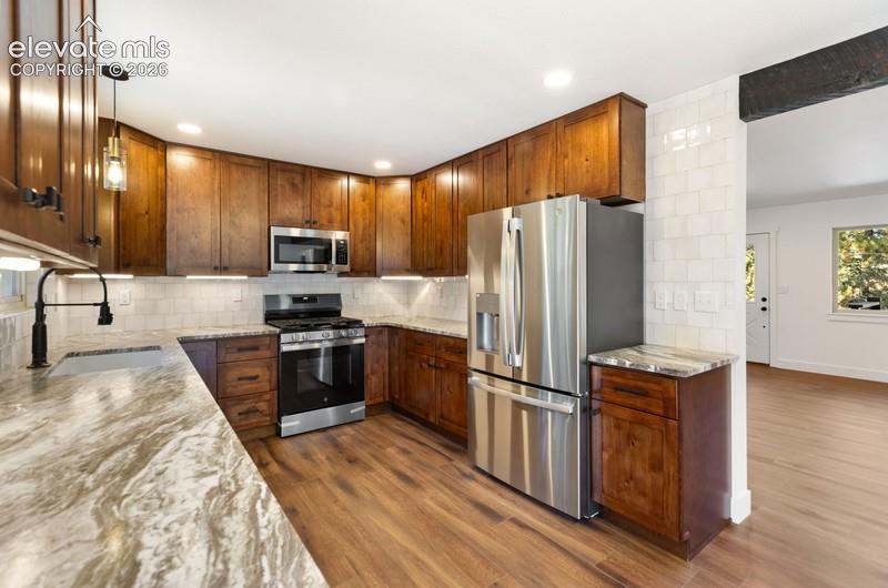Image 7 of 26: Kitchen and Dining room
