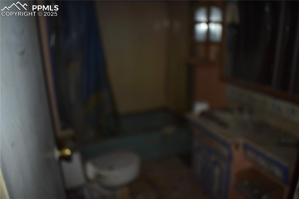 Image 17 of 23: Full bath featuring vanity and a tub