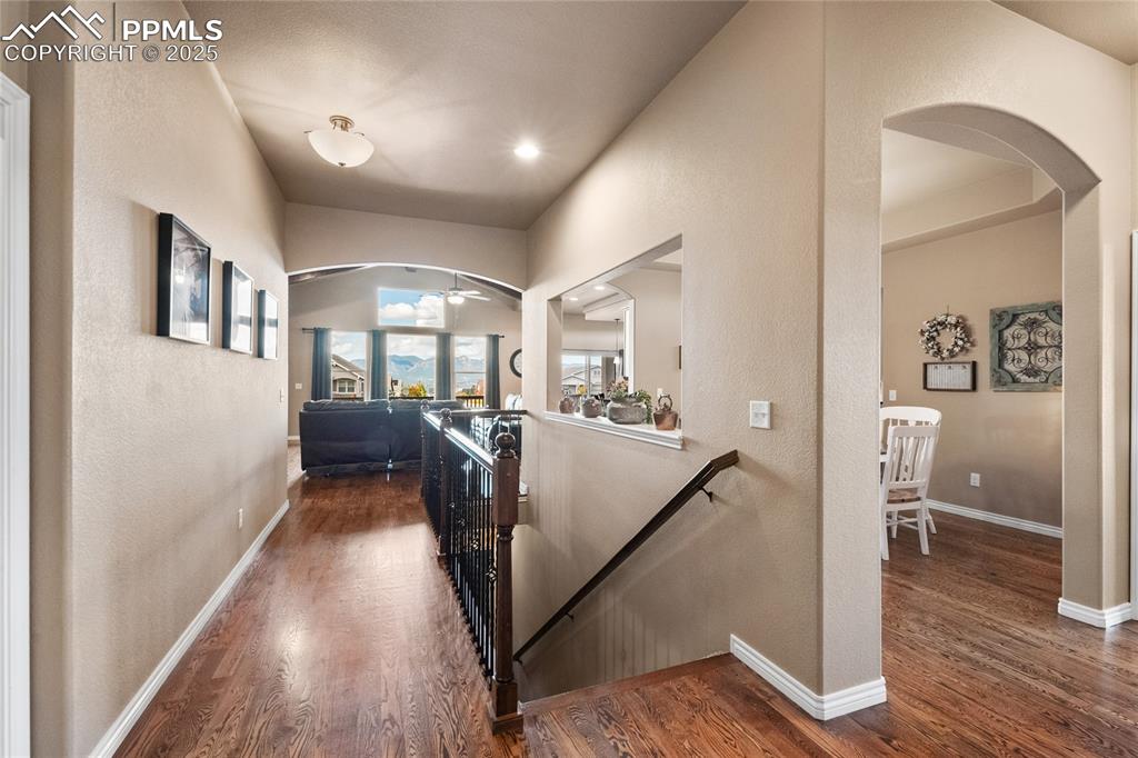 Image 13 of 49: Foyer with Hardwood flooring.