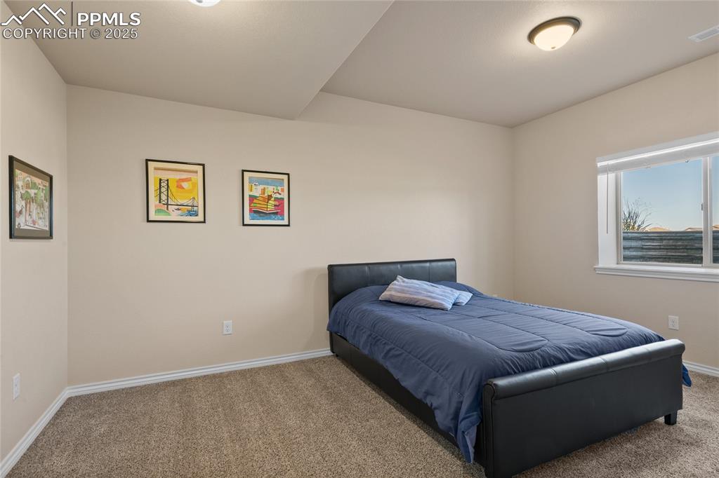 Image 40 of 49: Lower level bedroom #4.