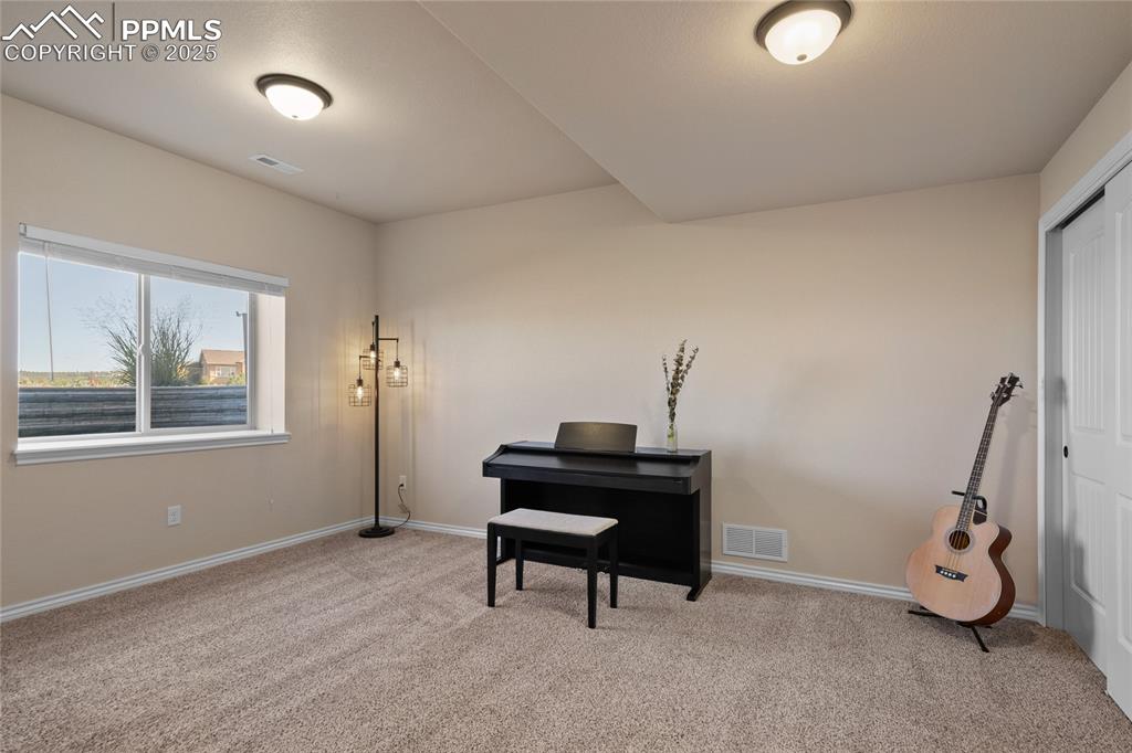 Image 41 of 49: Lower level bedroom #5.