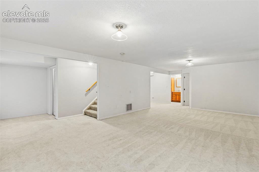 Image 27 of 50: Spacious Family/Rec Room in the basement
