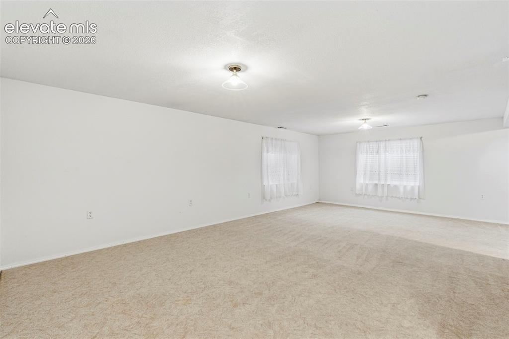 Image 28 of 50: Spacious Family/Rec Room in the basement