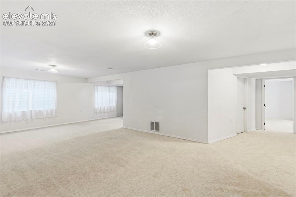 Image 29 of 50: Spacious Family/Rec Room in the basement