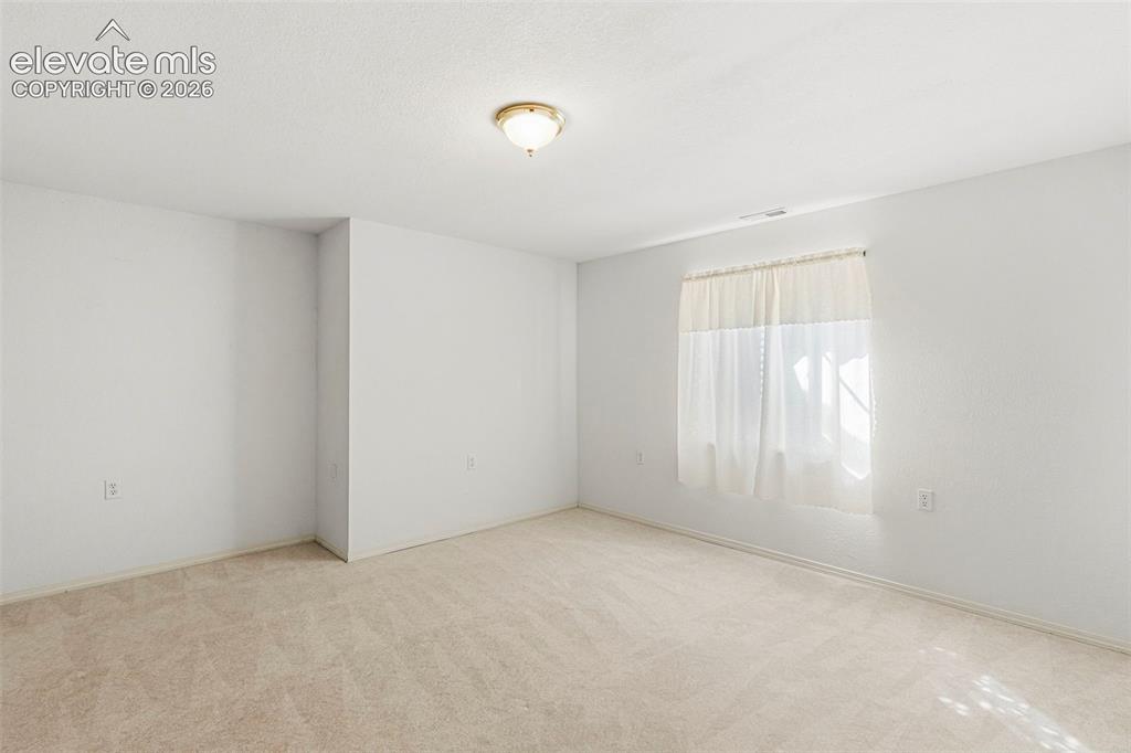 Image 33 of 50: 2nd Large basement bedroom w/ walk-in closet
