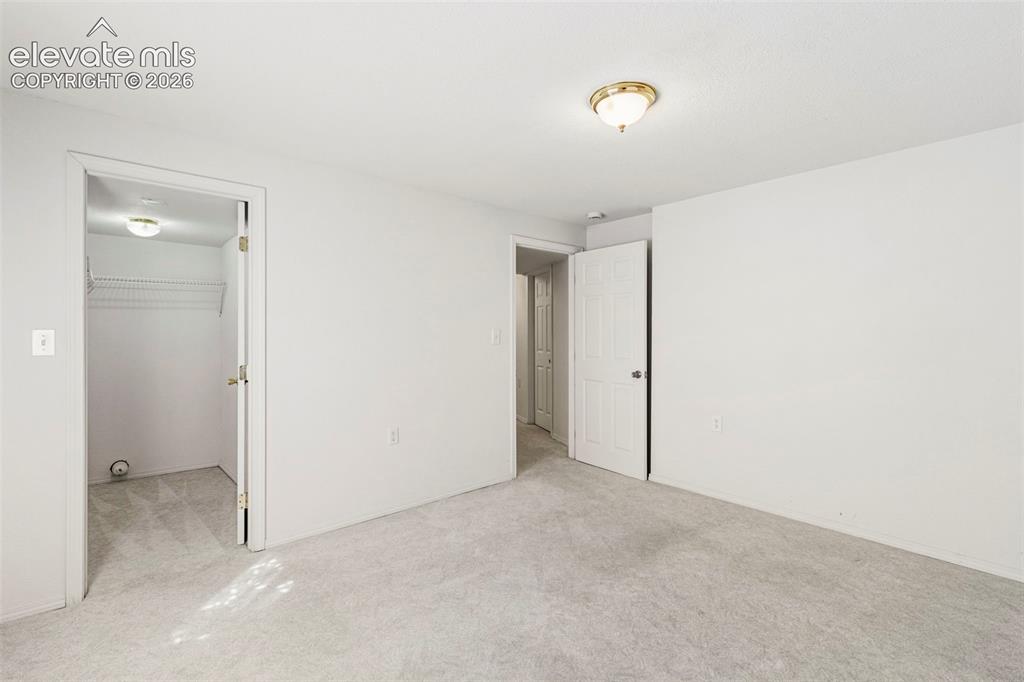 Image 34 of 50: 2nd Large basement bedroom w/ walk-in closet
