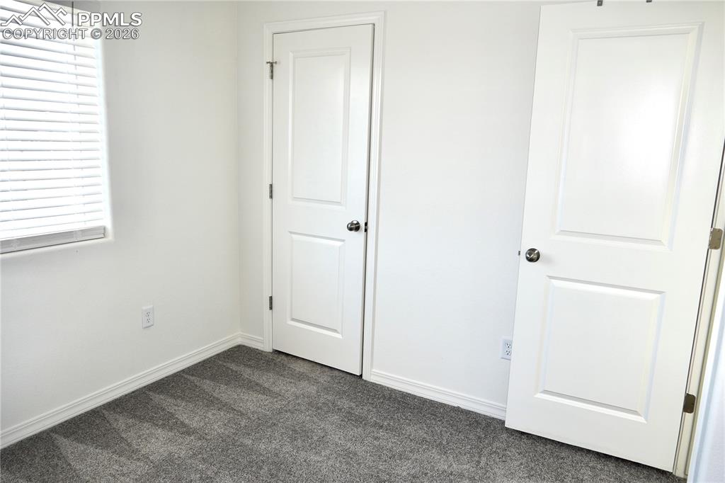 Image 12 of 23: Bedroom