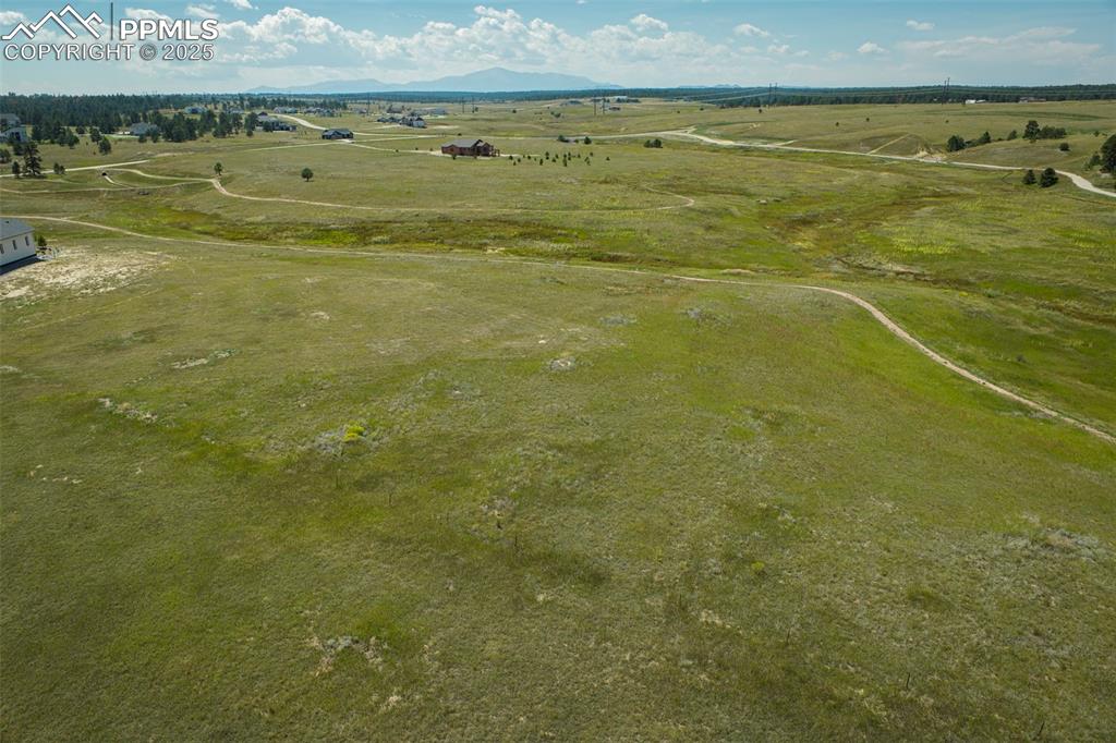 Image 4 of 17: View of rural area with mountains