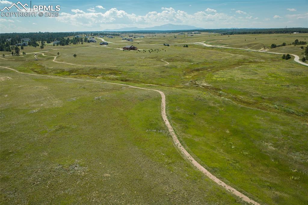 Image 5 of 17: Overview of rural landscape featuring mountains