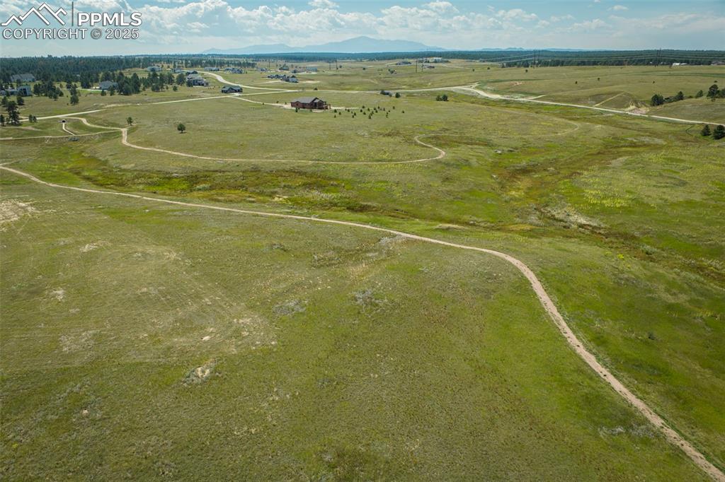 Image 6 of 17: Overview of rural landscape with mountains