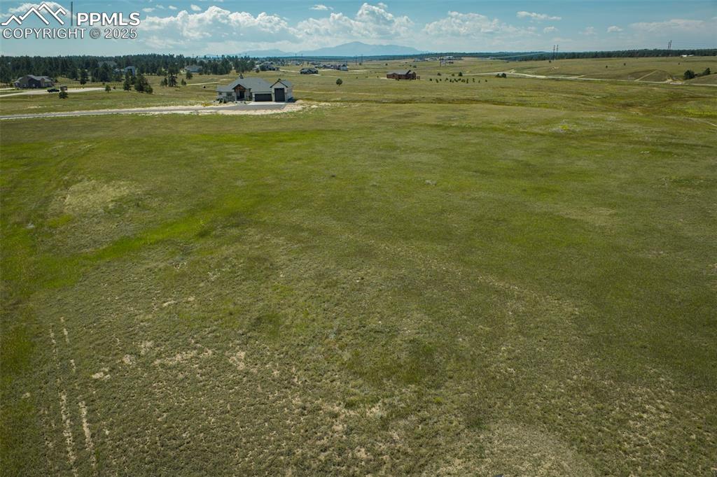 Image 7 of 17: Overview of rural landscape featuring a pastoral area