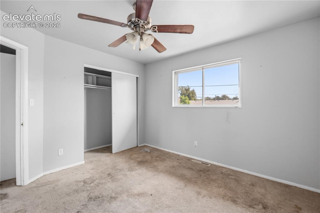 Image 10 of 31: Upper Level Primary Bedroom.