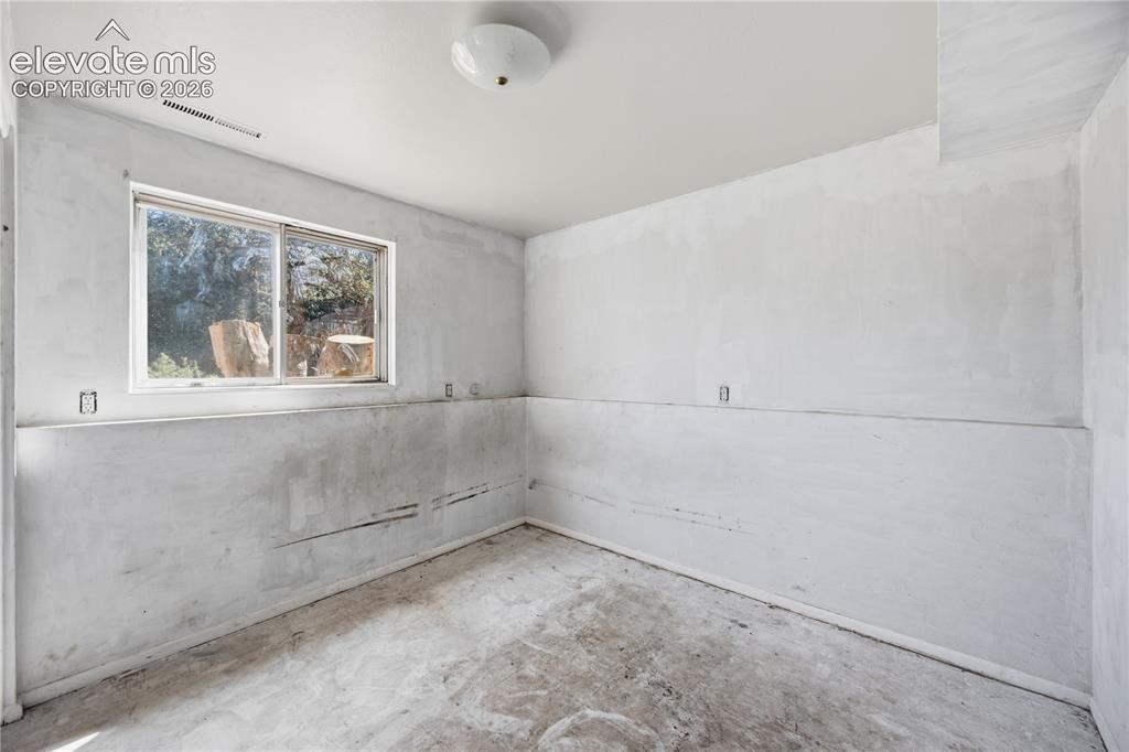 Image 19 of 31: Lower Level 4th Bedroom for guests, multigenerational living, or even a hom