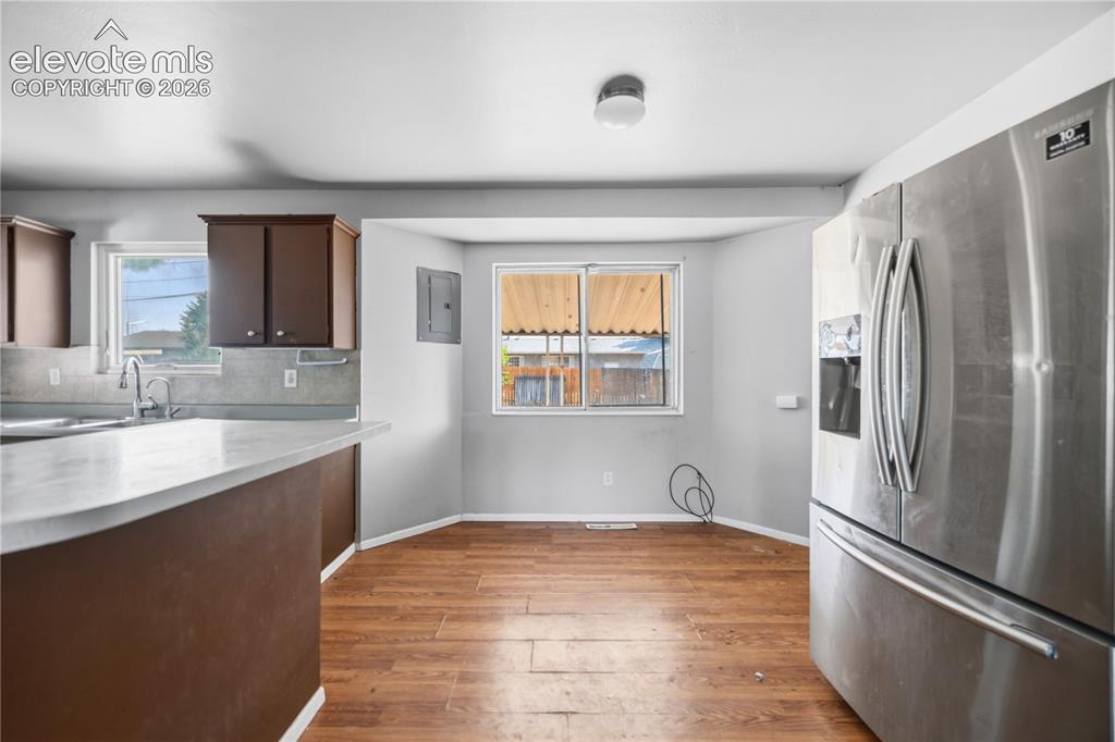 Image 5 of 31: View of the Dining Area from the Kitchen.
