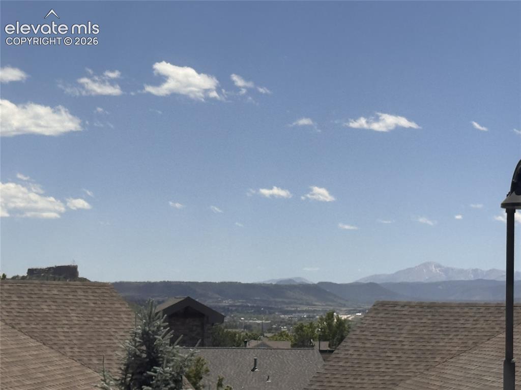 Image 15 of 17: Expansive mountain scenery with distant peaks