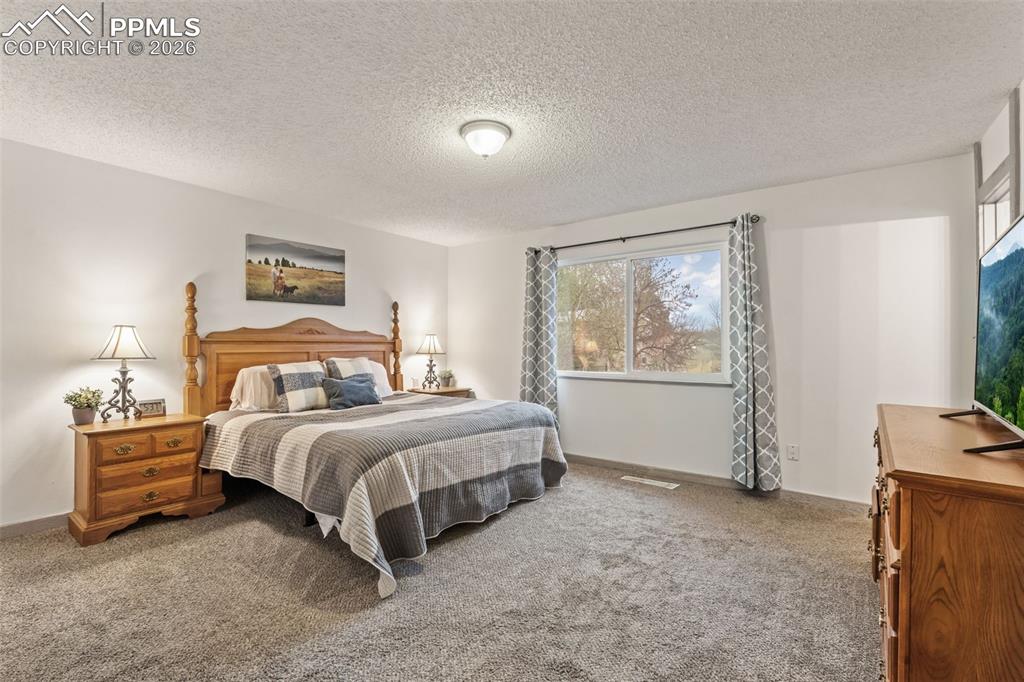 Image 16 of 36: Master Bedroom