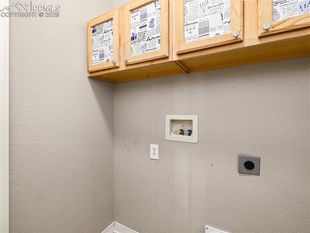 Image 9 of 23: Main level laundry