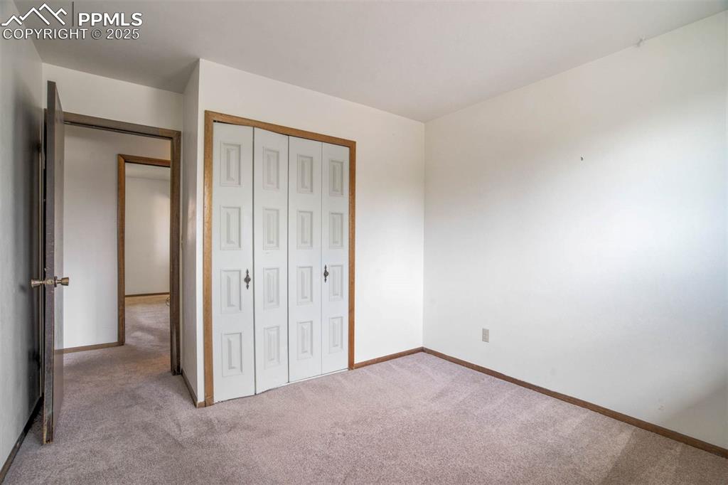 Image 22 of 49: 2nd bedroom- upper level