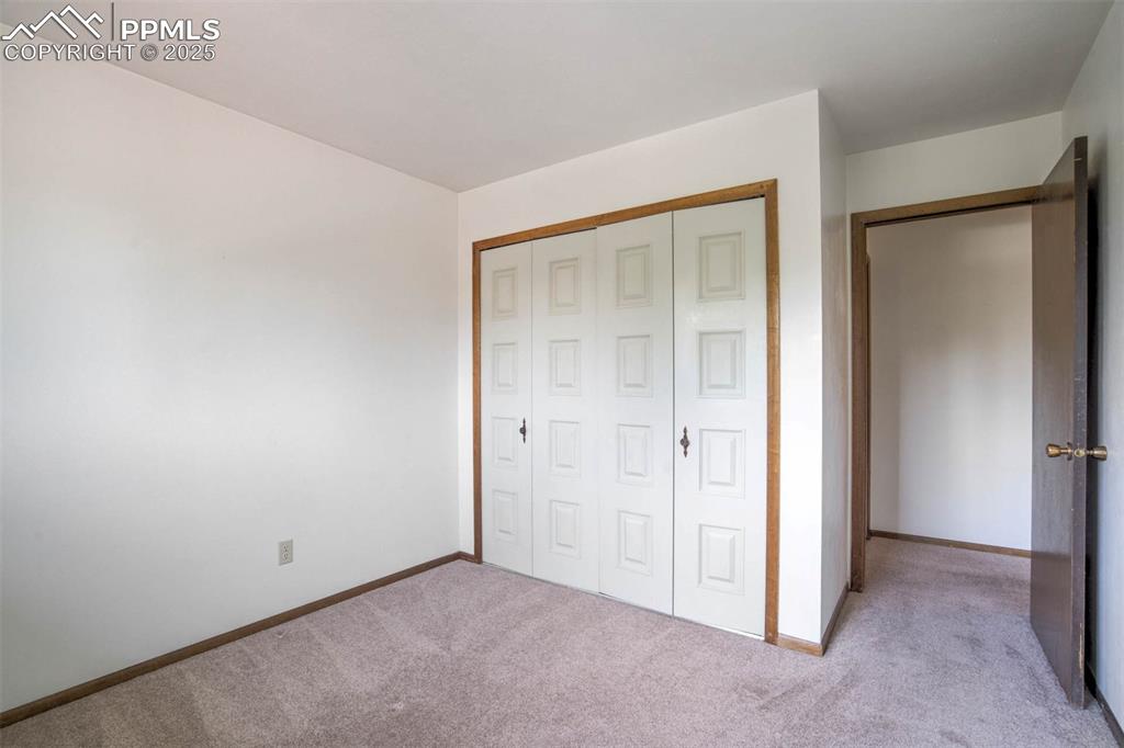 Image 24 of 49: 3rd bedroom-upper level