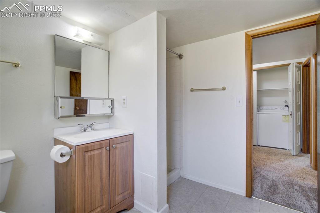 Image 36 of 49: Bathroom lower level