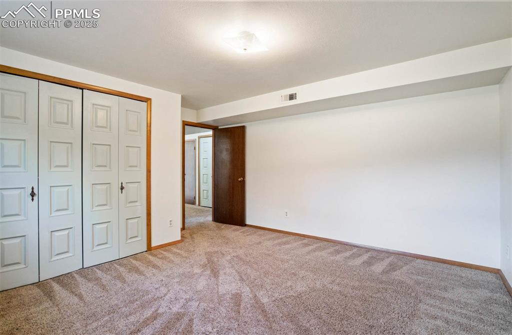 Image 37 of 49: 5th bedroom lower level