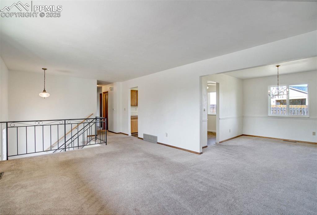 Image 8 of 49: Living room & dining room