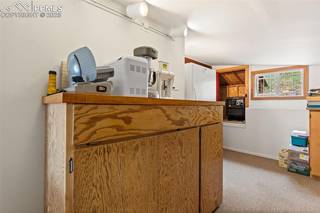 Image 26 of 45: Large Storage Room with Backup Generator for Electricity!