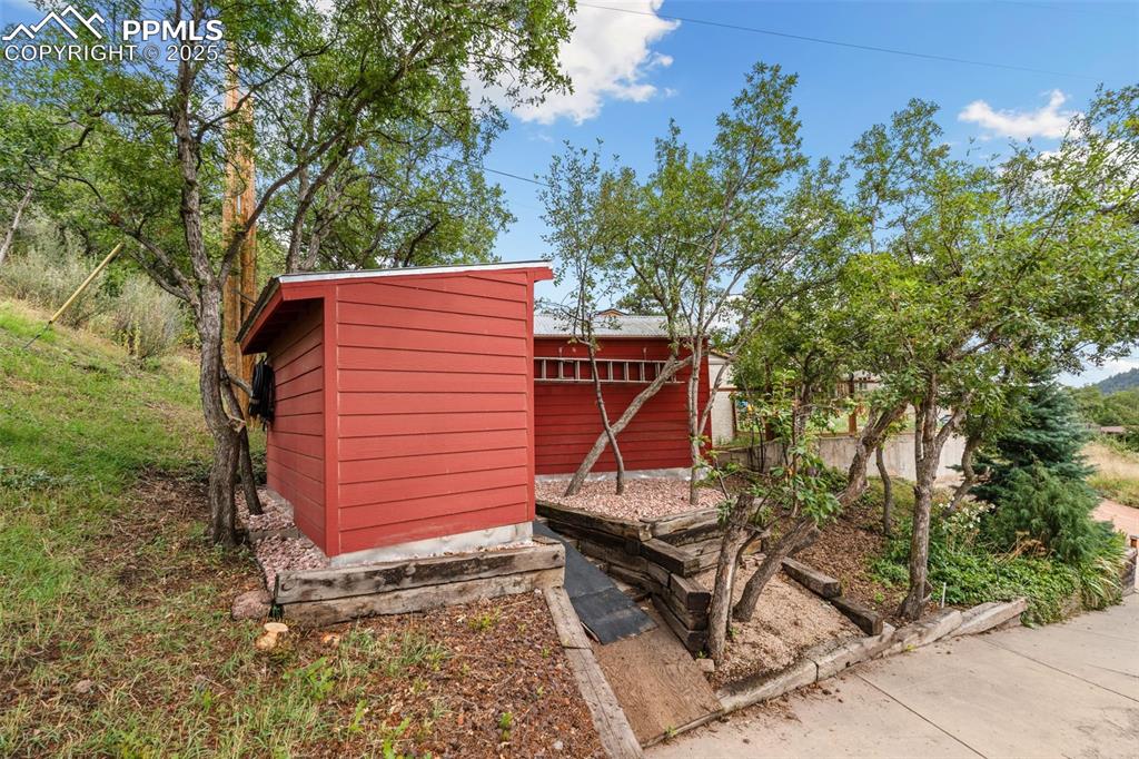 Image 39 of 45: 10 x 12 Vented Storage Shed with Steel Door & Treated Wood Floors!