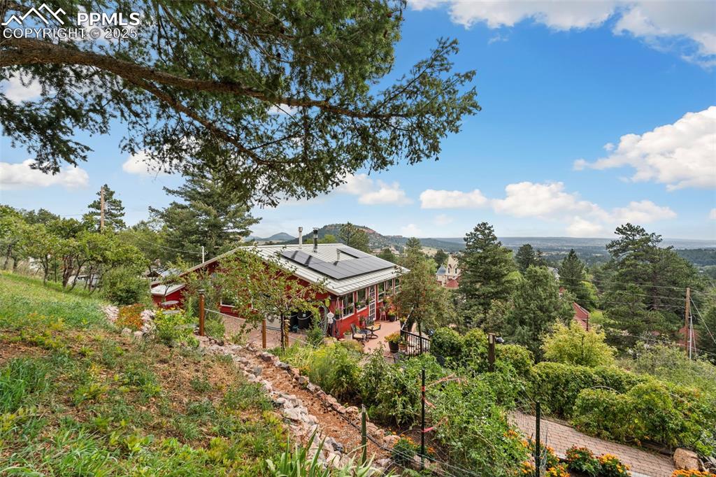 Image 42 of 45: 5 Garden Areas next to the Stone Paver Patio!
