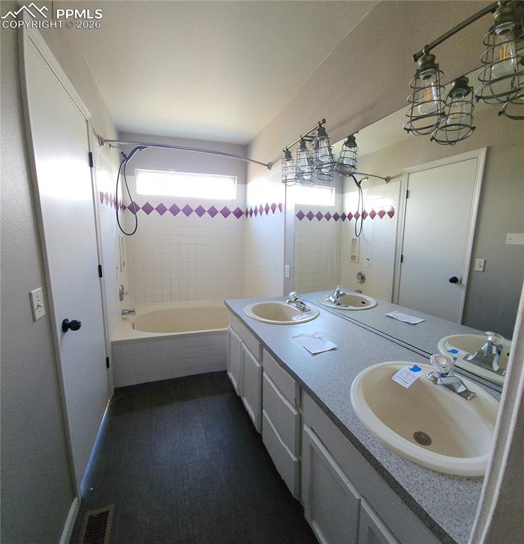 Image 19 of 35: primary bathroom