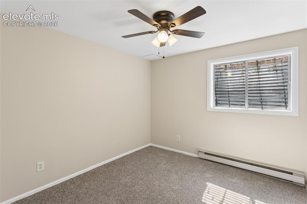 Image 29 of 40: 4th bedroom in basement