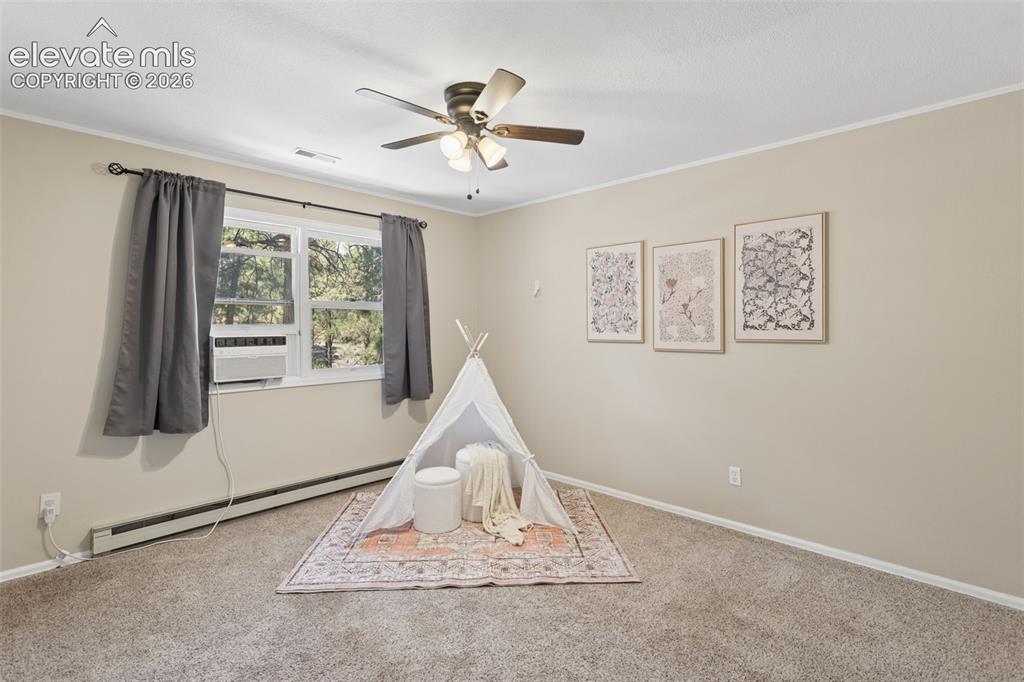 Image 31 of 40: 2nd bedroom upstairs