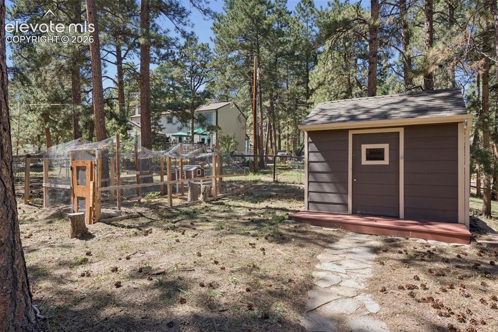 Image 36 of 40: Storage shed