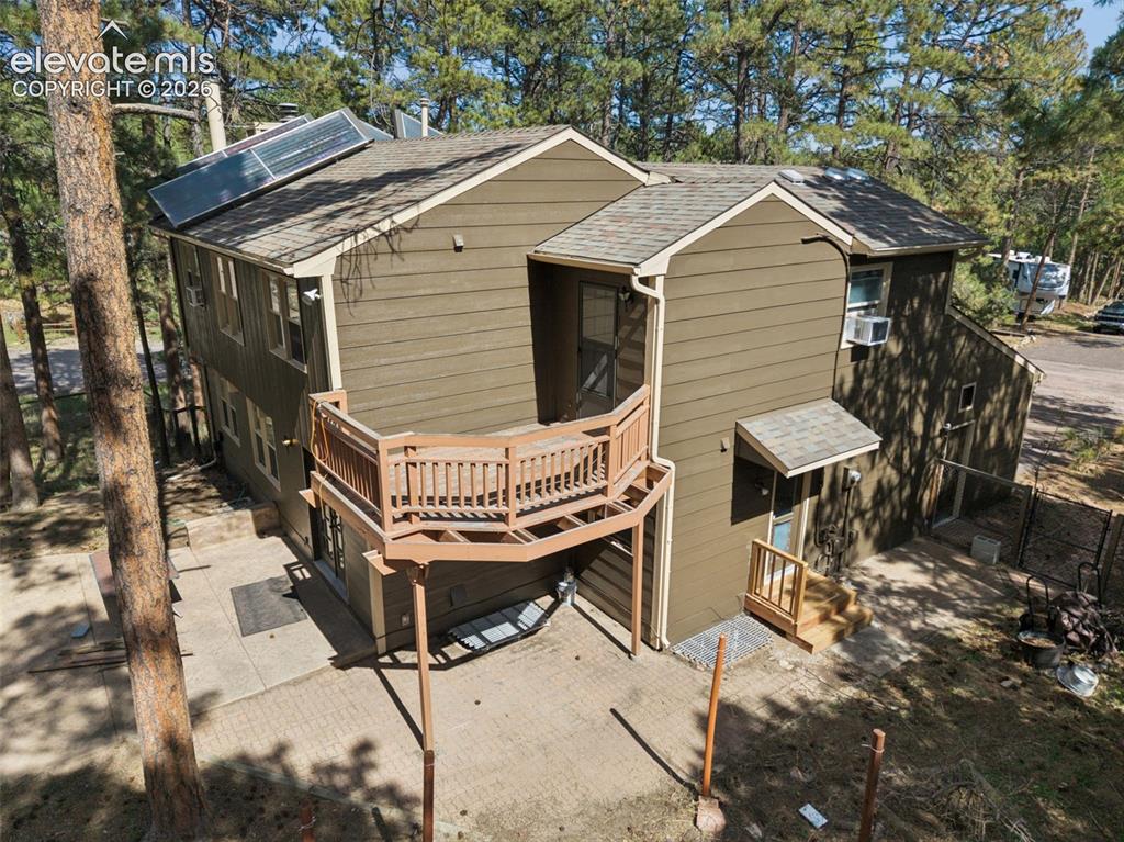 Image 8 of 40: Deck off of primary bedroom