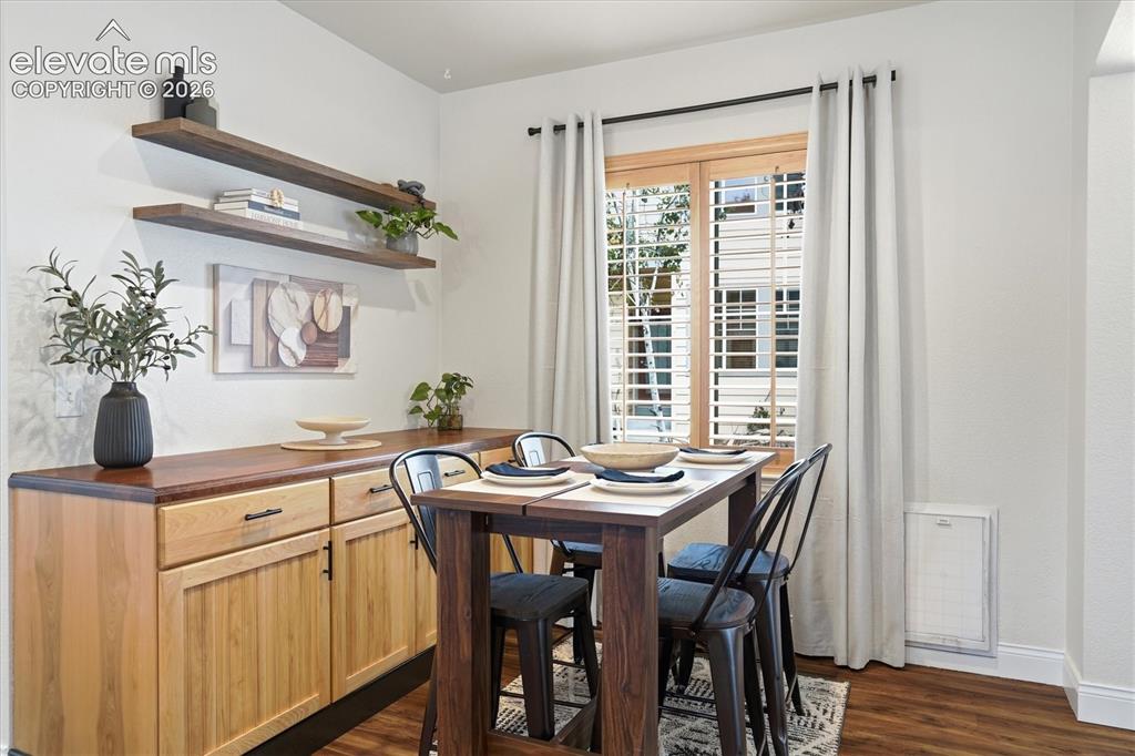 Image 15 of 50: Dining w/ built in additional storage