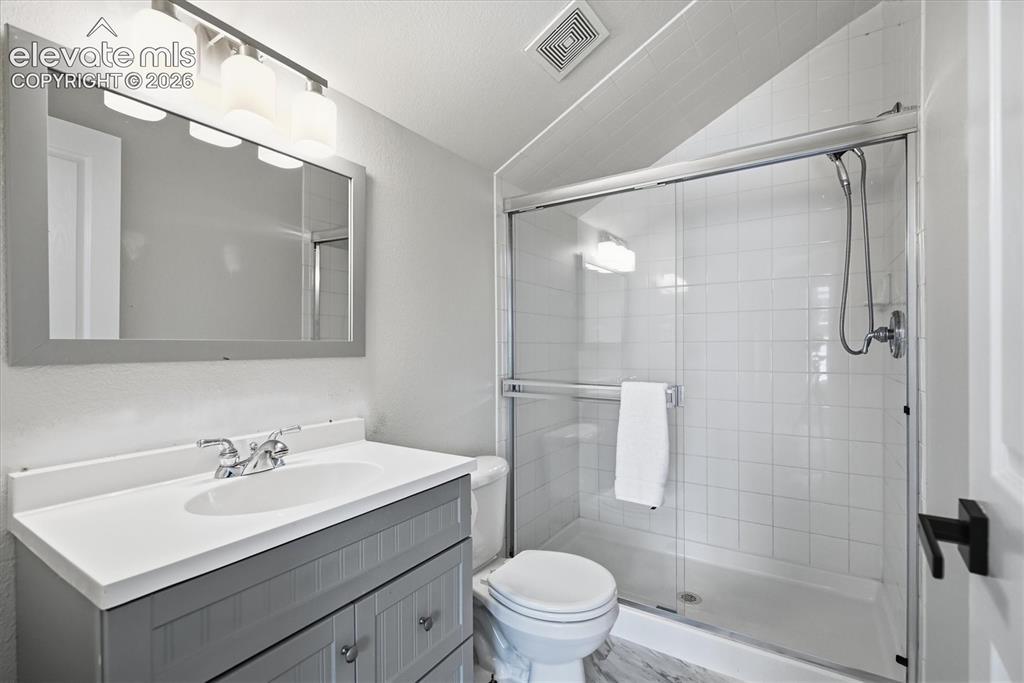 Image 33 of 50: 4th bedroom is a Carriage Style Suite w/ Private exterior entrance