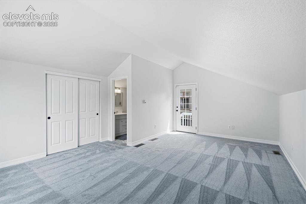 Image 7 of 50: Carriage Style Suite above garage w/ bath & closet