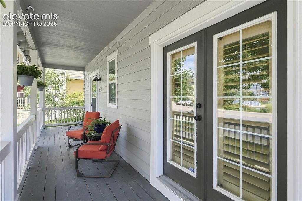 Image 8 of 50: Front Porch sitting at it