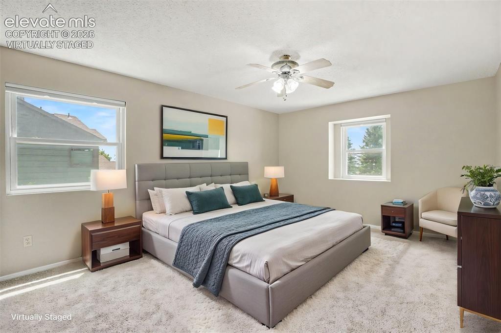 Image 16 of 40: Primary Bedroom. Virtually Staged.