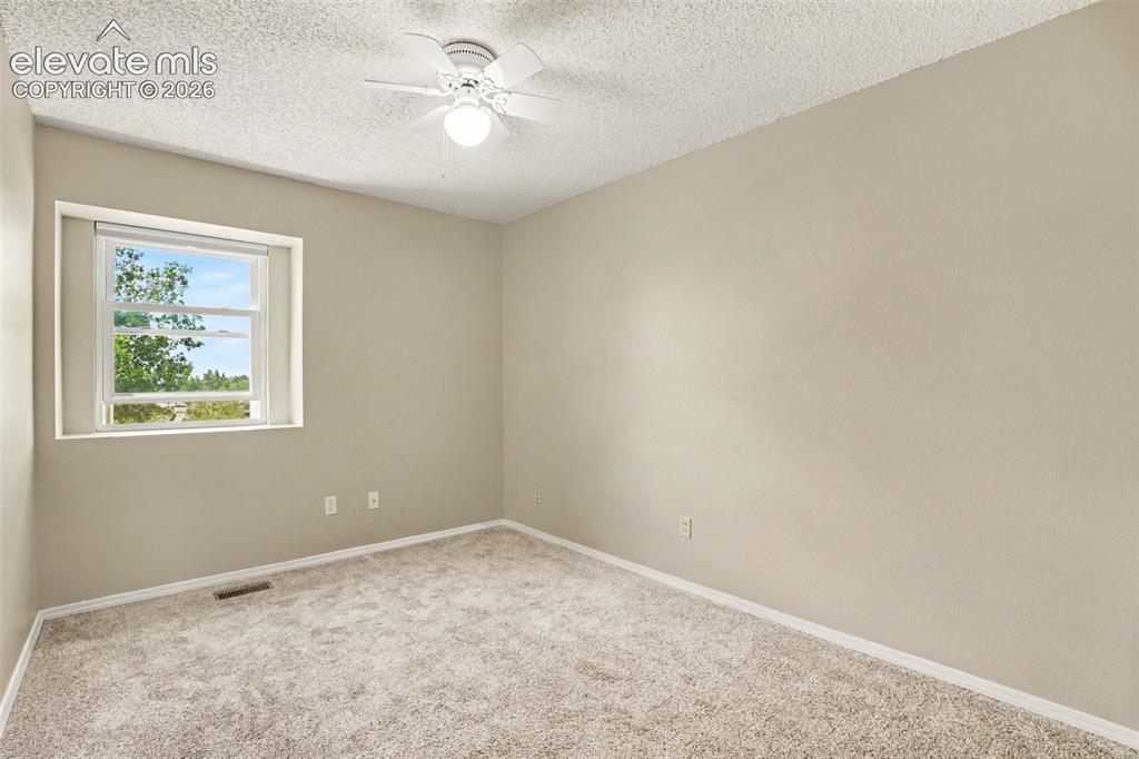 Image 22 of 40: Upstairs Bedroom