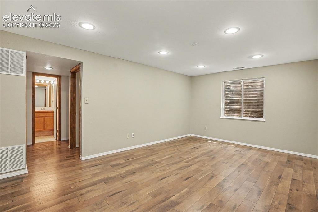 Image 26 of 40: Basement Family Room