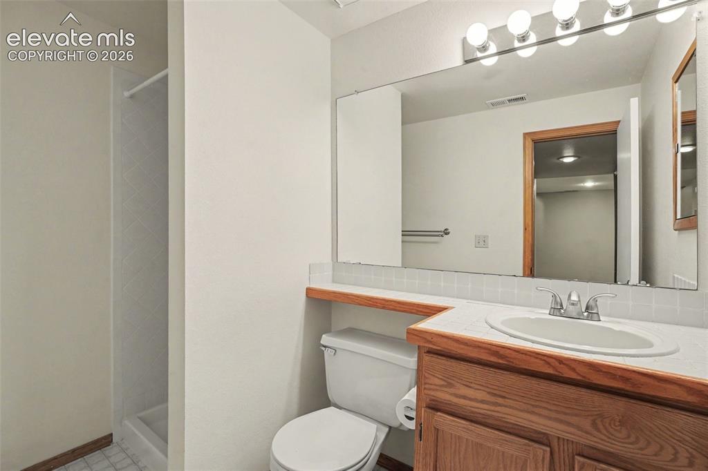 Image 29 of 40: Basement Bathroom