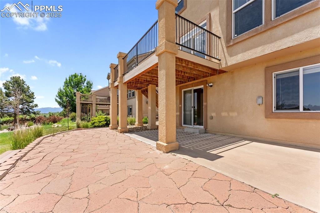 Image 42 of 48: Patio / terrace featuring a patio and stairway